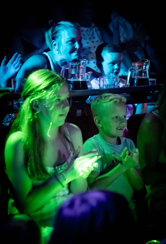 Children watching the show