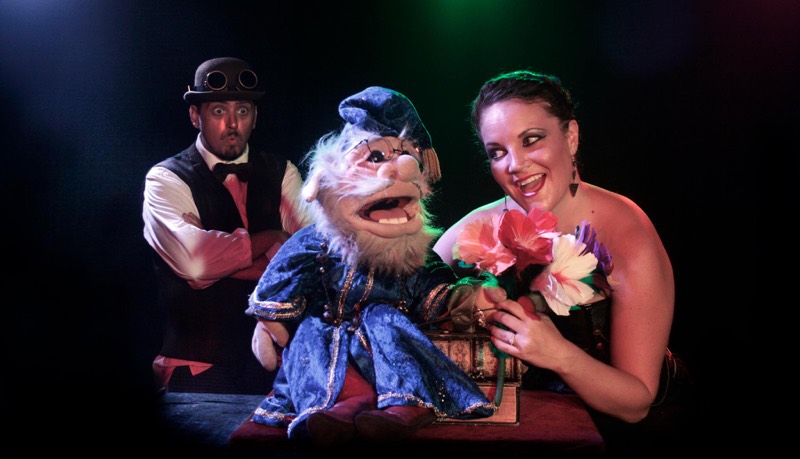Alarna and Eugene the puppet with a bouquet of flowers